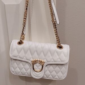 White Quilted Shoulder Bag with Gold Chain and Decorative Clasp